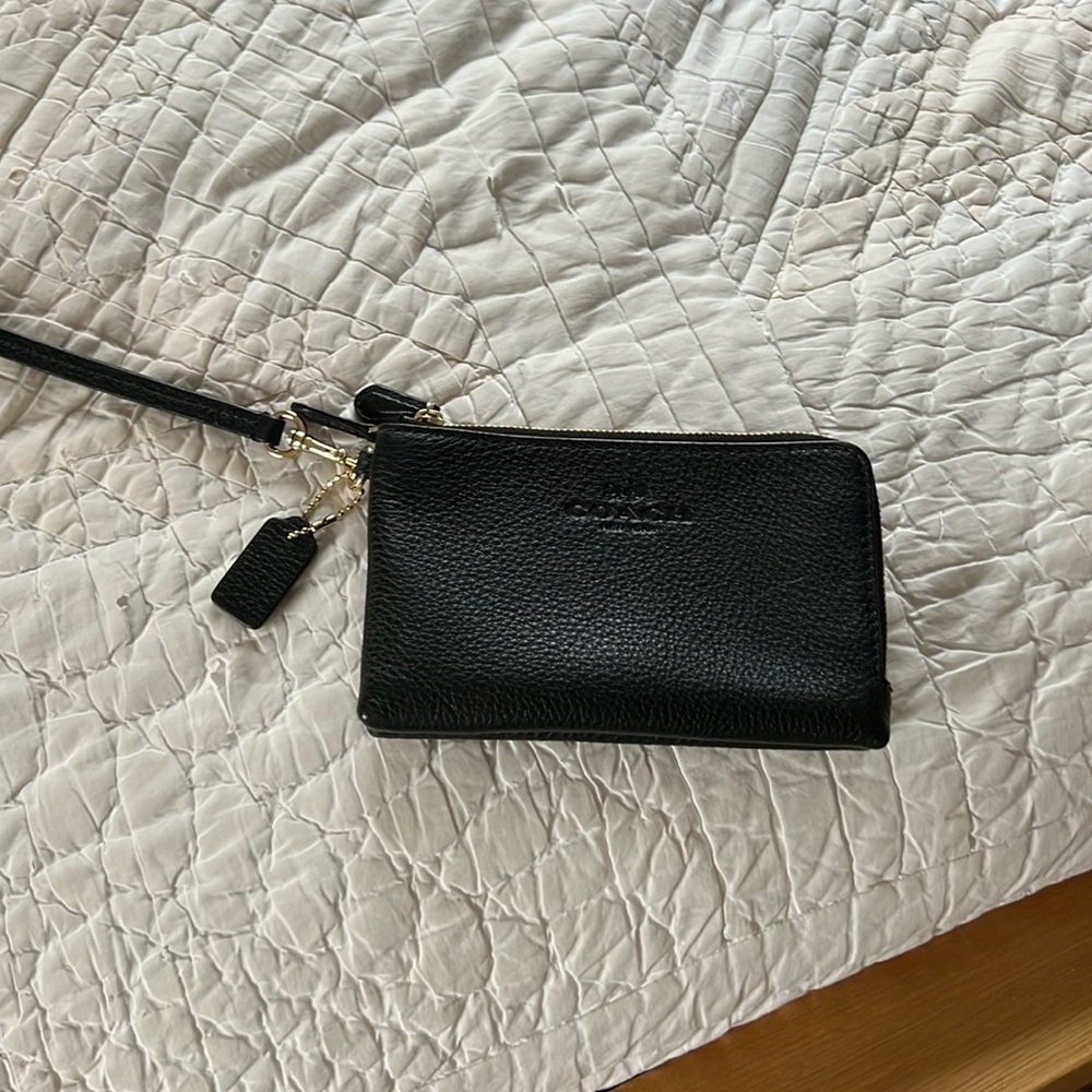 Black Coach small carry wristlet.New- no tags!